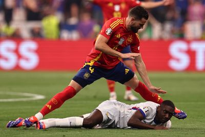 Controversial Football Incident Goes Viral: Nacho's Tackle on Kolo Muani Sparks Outrage